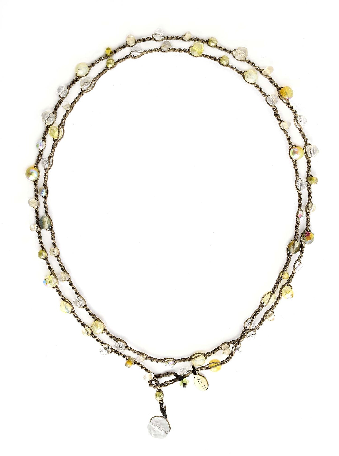 Hand-crafted with a blend of soft hues, it features vintage crystals, mercury glass, smoky and tea tones, vintage faux pearls, and pearlized beads.