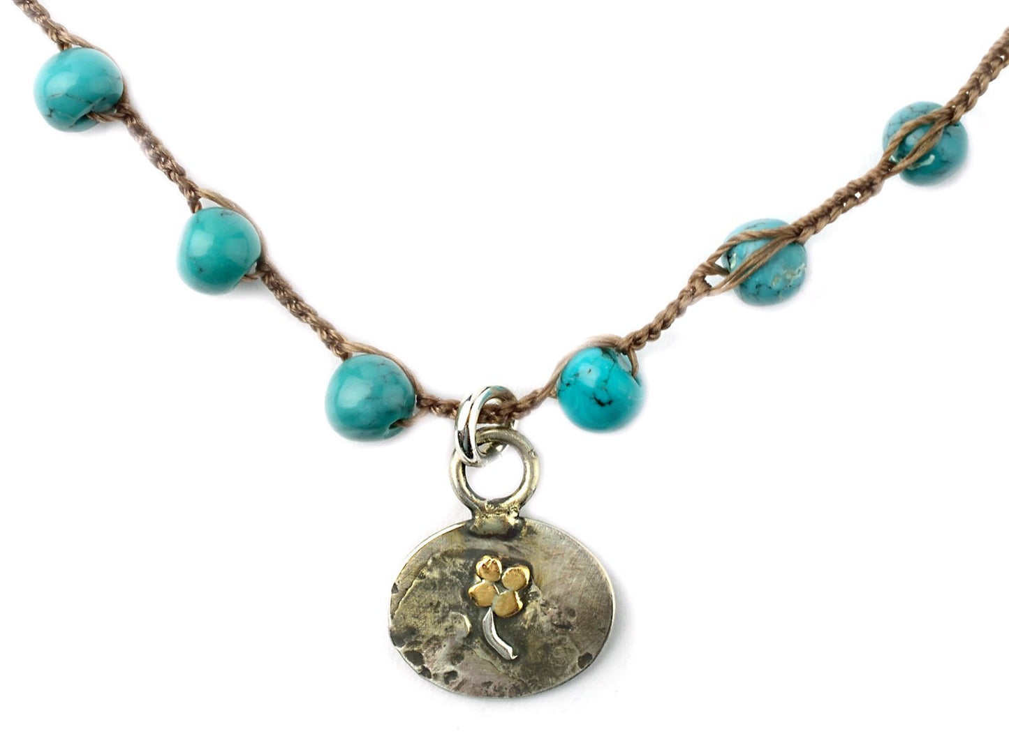onujewelry.com - Hand-forged Four Leaf Clover brass and sterling silver pendant on hand-crochet semi-precious Turquoise necklace created by Donna Silvestri, On U Jewelry, Richmond, VA
