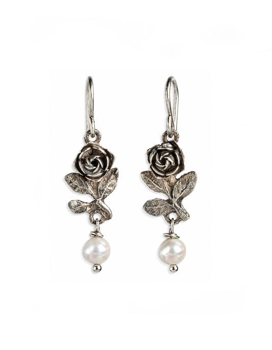 Roseto Earrings with sculpted sterling silver roses, textured leaves, and creamy natural pearl drops on silver ear wires.