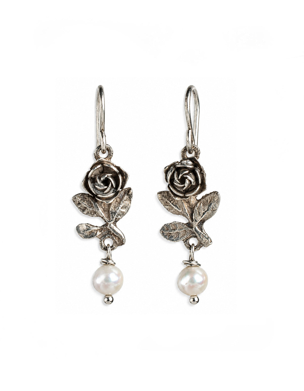 Roseto earrings with vintage sterling silver roses, textured leaves, and creamy white pearl drops by On U Jewelry.